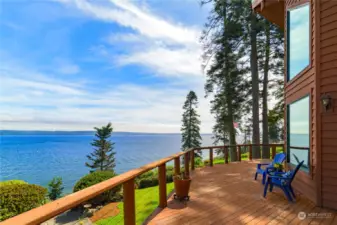 French doors from primary suite open to this glorious deck!