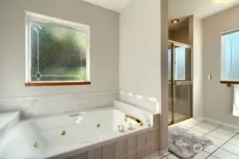 Primary bath with jetted tub and separate walk in shower.