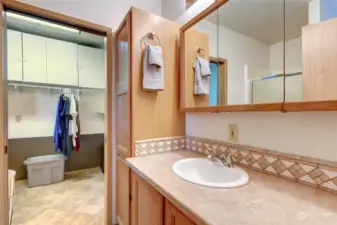 This 3/4 bath is beside the family room and the laundry room is beyond it.