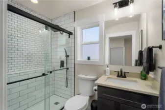 Main floor bathroom attached to bedroom.