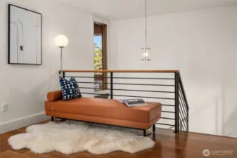 Upstairs landing perfect for lounging or reading area.
