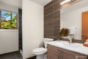 Main level bath near kitchen.