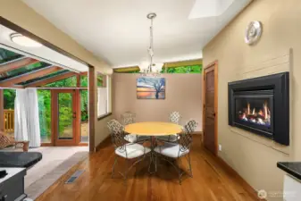 dining room looking back from the kitchen, has fireplace provides great heat!
