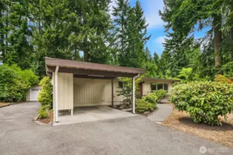 Original carport provides a convenient 3rd covered parking space