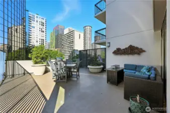 Common area patio with firepit table.