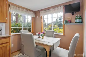 And a dining area with large corner windows!