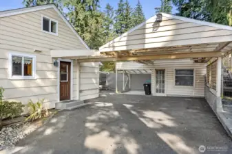 There's a shop, carport, and driveway parking for at least six cars!