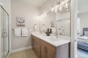 Photos of the staged model home with the same floorplan and similar finishes.