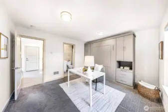 ground floor guest suite with en suite bathroom. Murphy bed and built in desk provides maximum flexibility