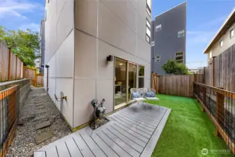 Backyard and side yard provide low-maintenance outdoor space. Excellent for kids, pets, easy enjoyment, etc.