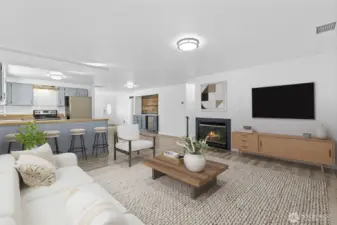 Gather around the cozy wood-burning fireplace. *Virtually Staged*