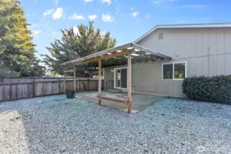 Low-maintenance, fully-fenced yard with separate dog run