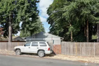 This is where GPS will take you.  However, go around to the alley access. You will see the for sale sign and parking area.