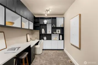 Dedicated office with custom built-ins on the main living area
