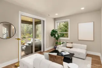 The main level includes a family room, 2nd bedroom and full bath, and access to the fully fenced yard