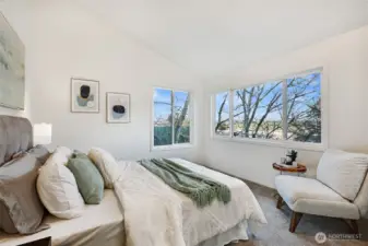 One of two spacious bedrooms upstairs - this one takes in Cascade Mountain views!