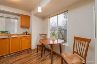 Sweet kitchen with eating space and look out into the courtyard while enjoying your morning coffee!
