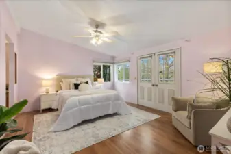 Primary bedroom with private access to the back deck