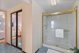Large walk in closet in primary bathroom