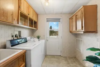 Spacious utility room. Washer and dryer included.