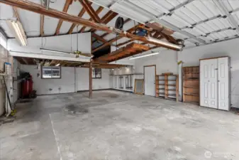 Large, detached garage fits 4 cars. Don't miss the loft storage above.