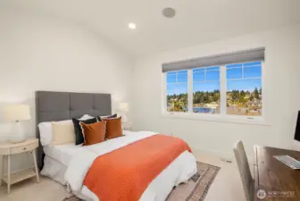 First of three additional bedrooms upstairs.