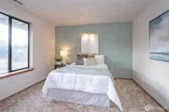 second upstairs bedroom with accent wall