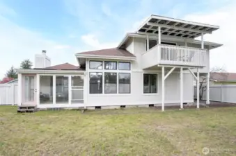 Large yard, fully fenced on a corner lot.