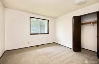 Upper level 2nd bedroom with new carpet, 3 of 5.