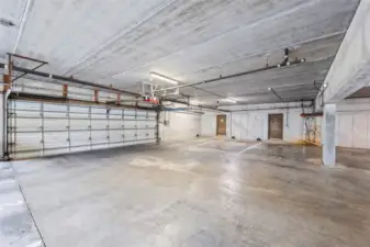 Secured garage parking with an additional designated space offers peace of mind and easy access. An extra storage unit in the garage provides even more convenience.