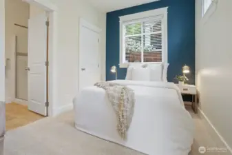 Lower level daylight bedroom has own private ceramic bath.