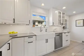 Updated kitchen has farm sink.