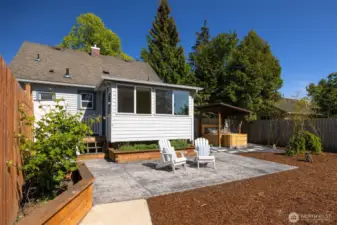 The stamped concrete patio is the perfect perch to soak in vibrant western sunsets.