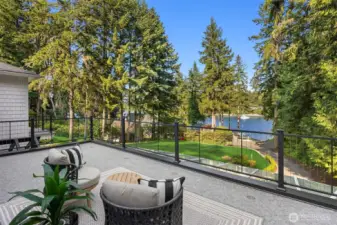 French doors to expansive views of the grounds and waterfront.