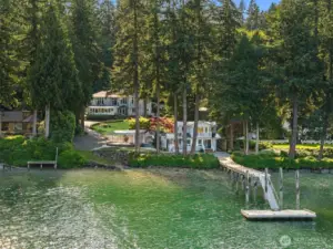 An incredibly rare waterfront compound with 2 houses! The 4300 sq ft estate quality main house and a 1300 sq ft beach house.