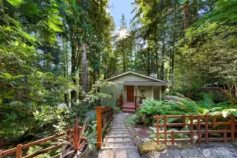 From the main parking area walk down the stairs to a whimsical treat, there is so much to see on this property!
