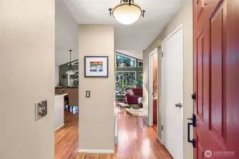Enter the home to the kitchen, dining and living room on main floor with a 1/2 bath.