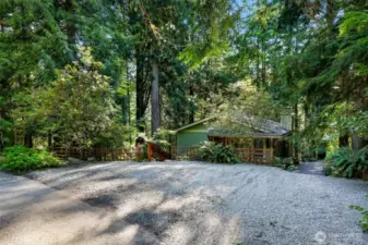 Driveway parking set above grade of the home