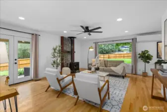 Living room with French doors opening up to your porch