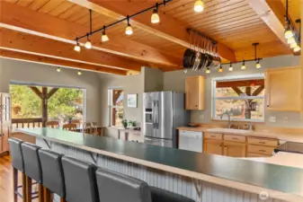 Ample bar seating for entertaining guests or for your casual breakfast while catching up on reading the paper.