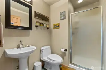 Main floor 3/4 bathroom.  Radiant floor heating.