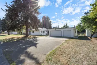 Lots of parking available, long driveway and 3 garage bays.