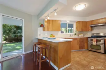 Eating bar between dining room and kitchen.