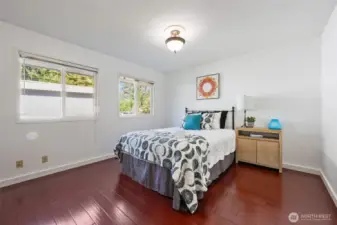 Primary bedroom at end of hallway.