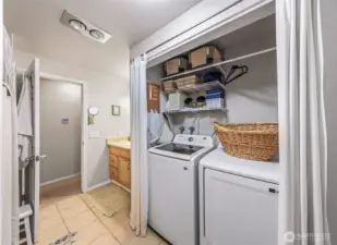Full bathroom with tub/shower combo and utility area. New washer/dryer coming soon.
