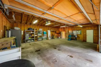 Plenty of room for your cars and your projects. Cabinets for tools.