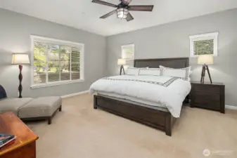 The primary suite offers a calming balance of light and space