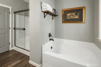 Unwind in comfort, with a soaking tub and walk-in shower designed to bring a touch of spa-like relaxation.