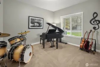 This flexible space offers the perfect setting to create, play, or simply unwind in your own tempo.