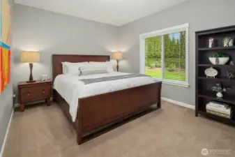 This guest room offers restful views and timeless style.